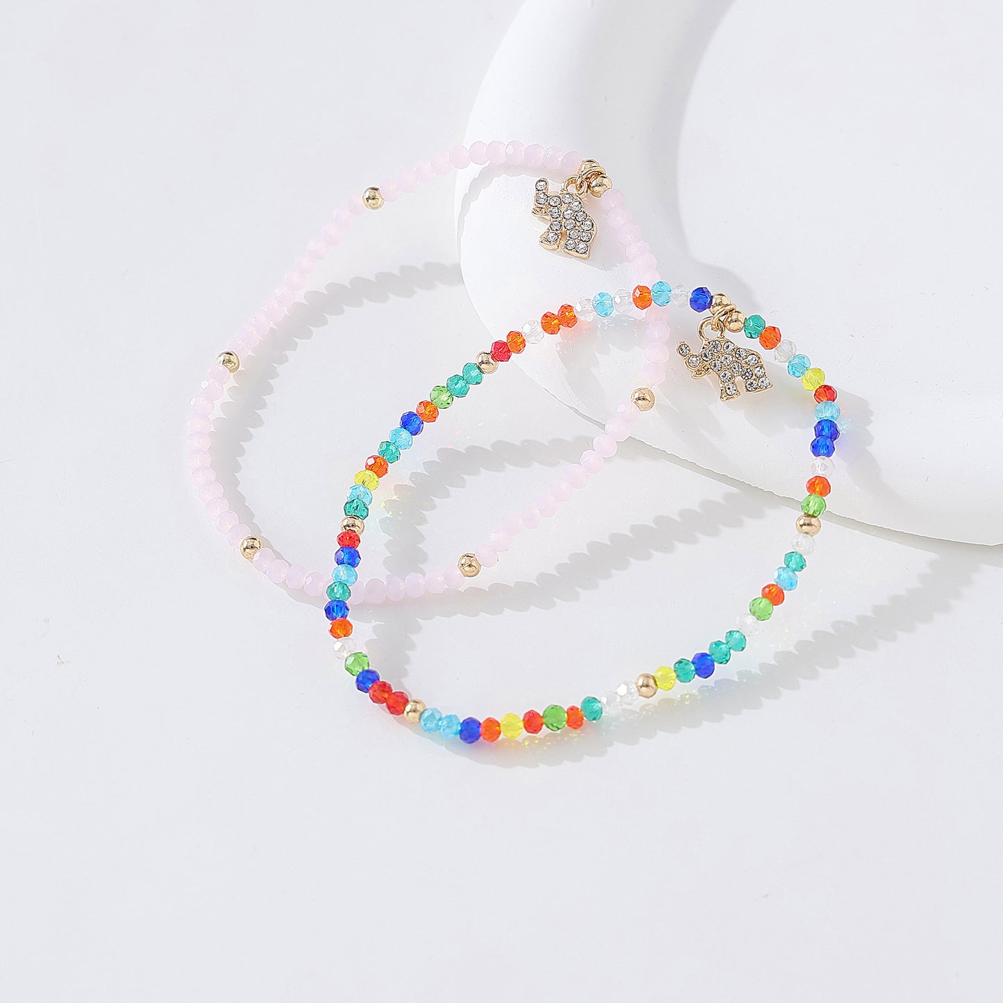 Chic Assorted Beaded Bracelets with Sparkling Crystal Elephant Charms - Perfect for Layering and Gifting