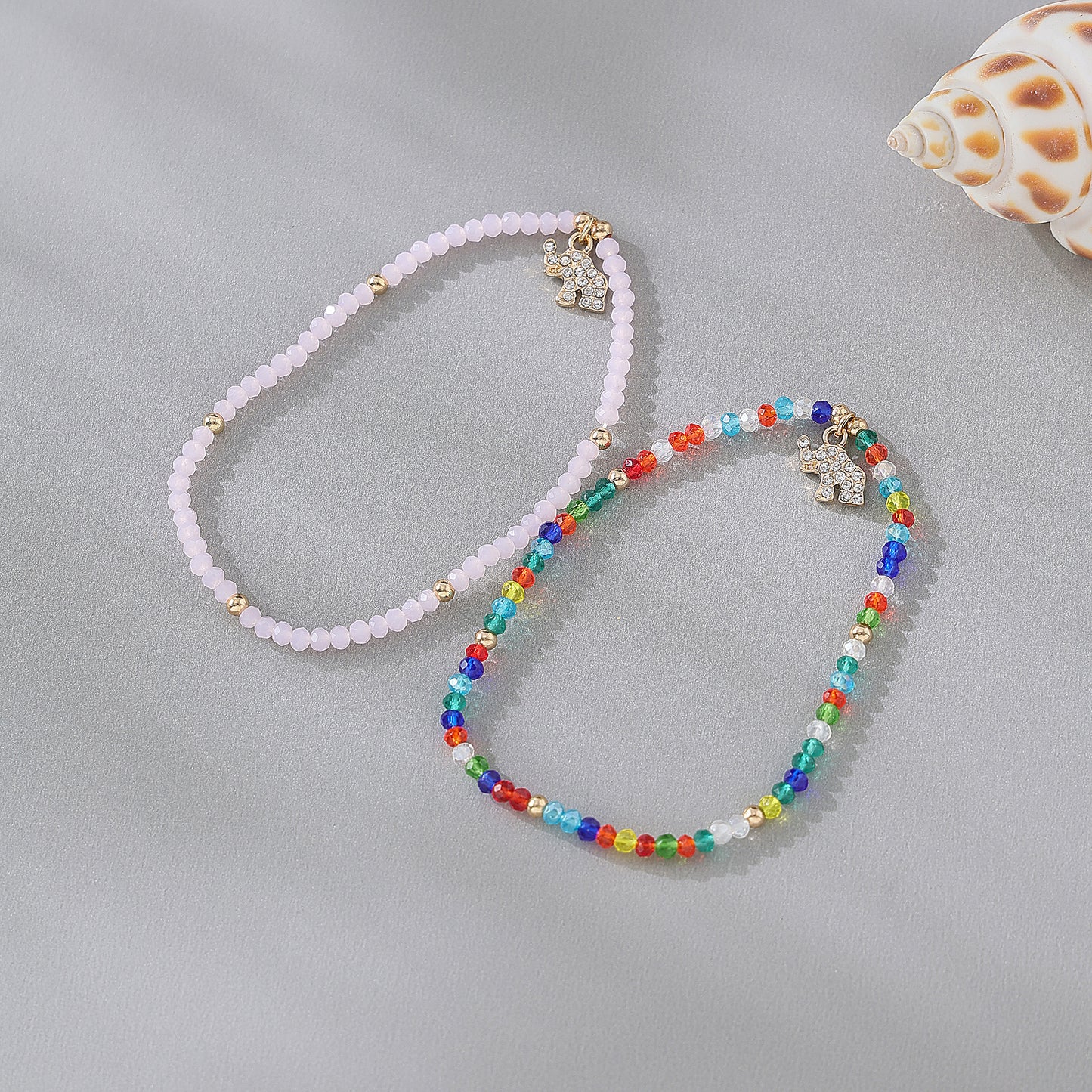 Chic Assorted Beaded Bracelets with Sparkling Crystal Elephant Charms - Perfect for Layering and Gifting
