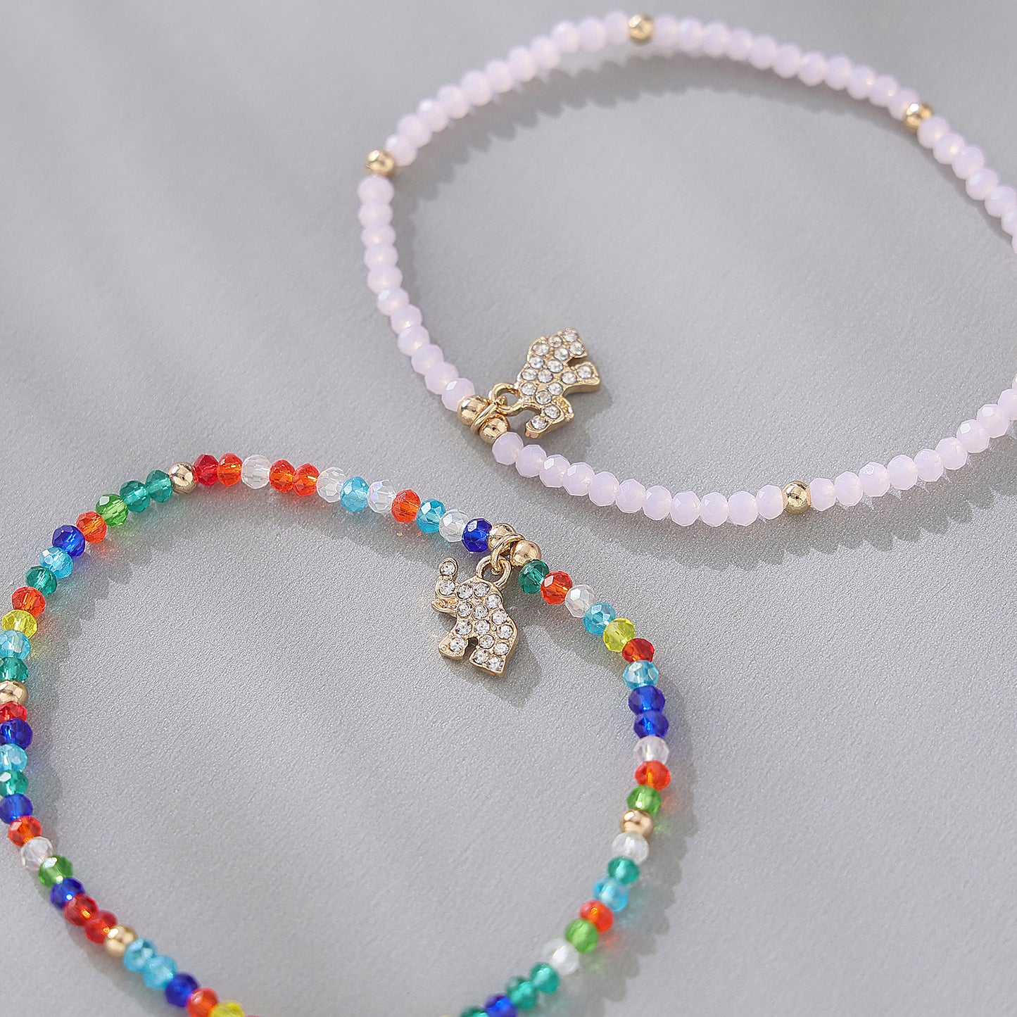 Chic Assorted Beaded Bracelets with Sparkling Crystal Elephant Charms - Perfect for Layering and Gifting