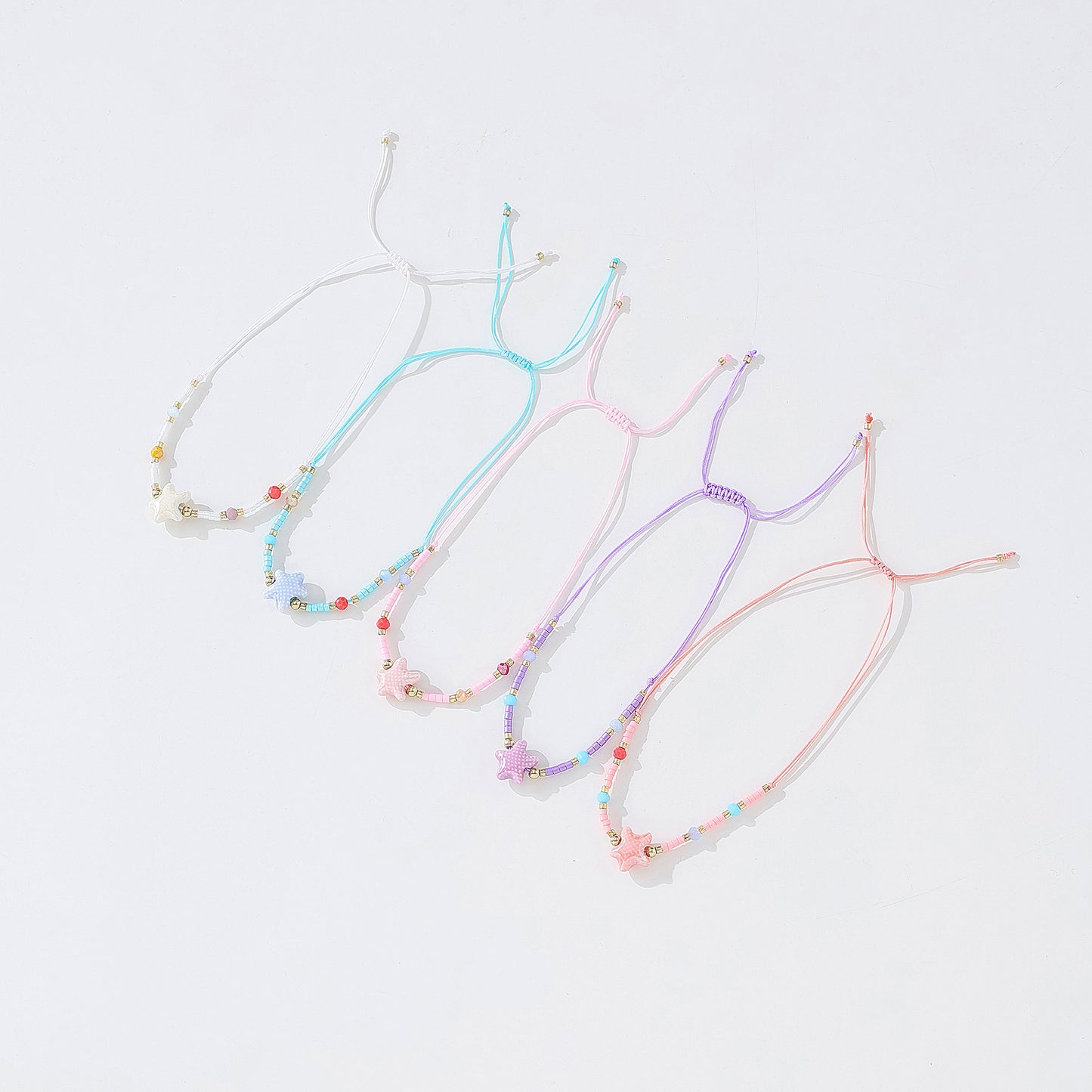 Charming Beaded String Bracelets with Color - Coded Ceramic Starfish Charms for Women and Girls, Handmade Adjustable Bracelets for Beach, Casual, and Party Occasions