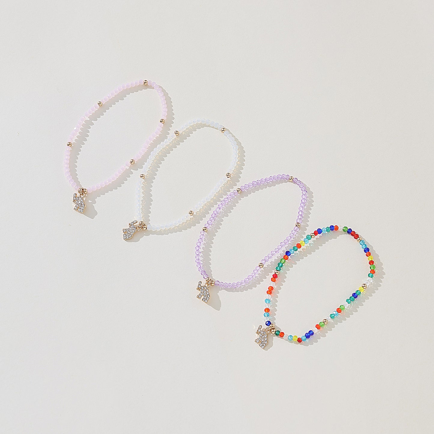 Chic Assorted Beaded Bracelets with Sparkling Crystal Elephant Charms - Perfect for Layering and Gifting