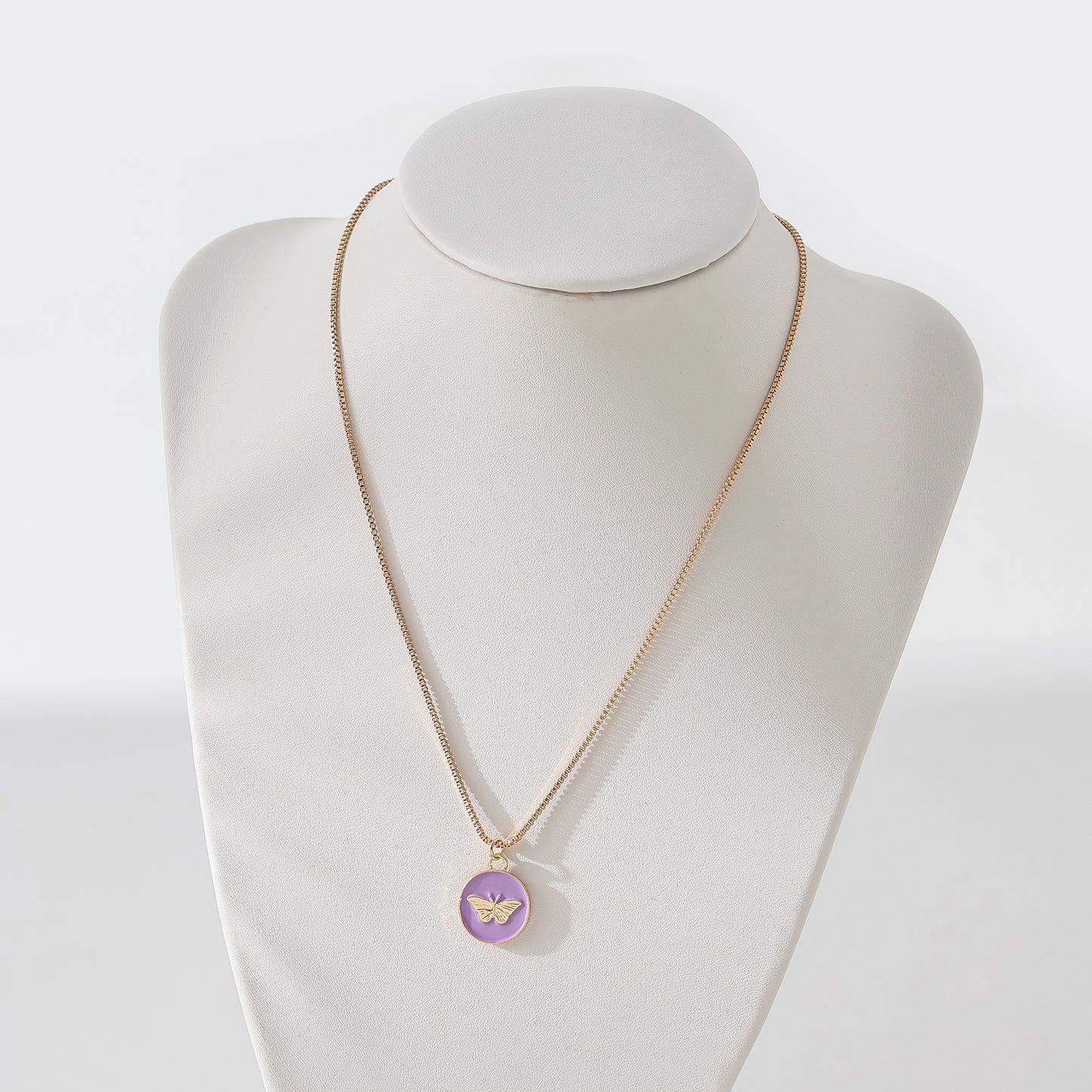 Enchanting Gold - Tone Chain Necklace with Round Enamel Pendants Featuring Delicate Butterfly Designs