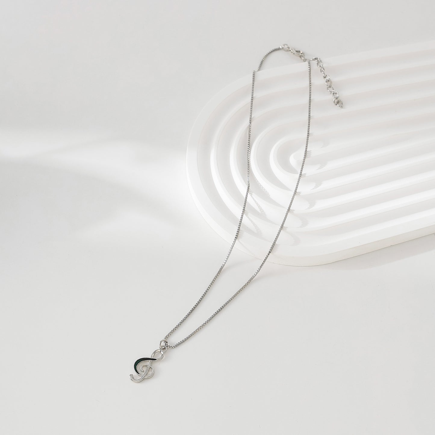 Exquisite Silver Treble Clef Necklace with Black - Accented Charm on Delicate Silver Chain