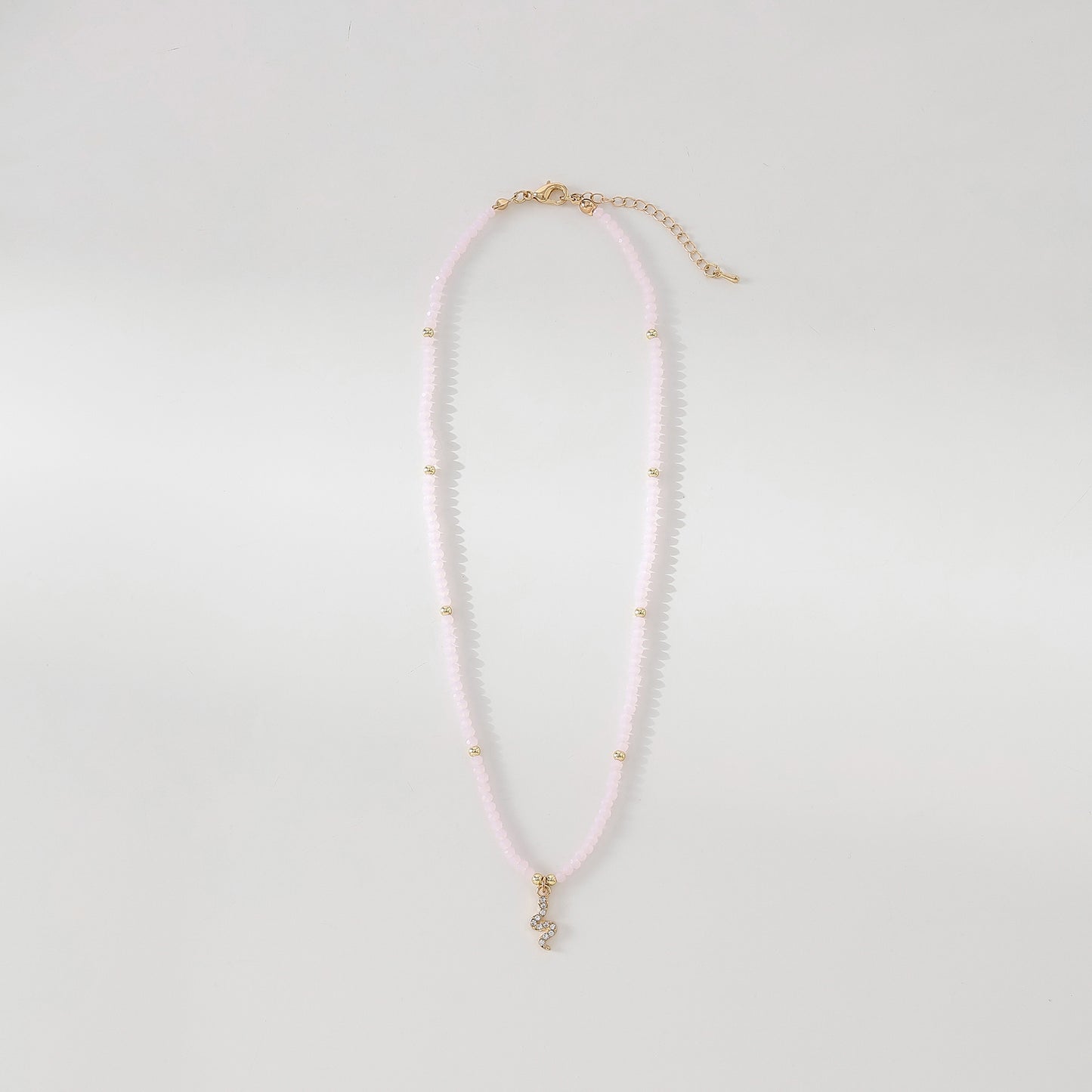 Gold Snake with rhinestones on assorted Beaded Necklace
