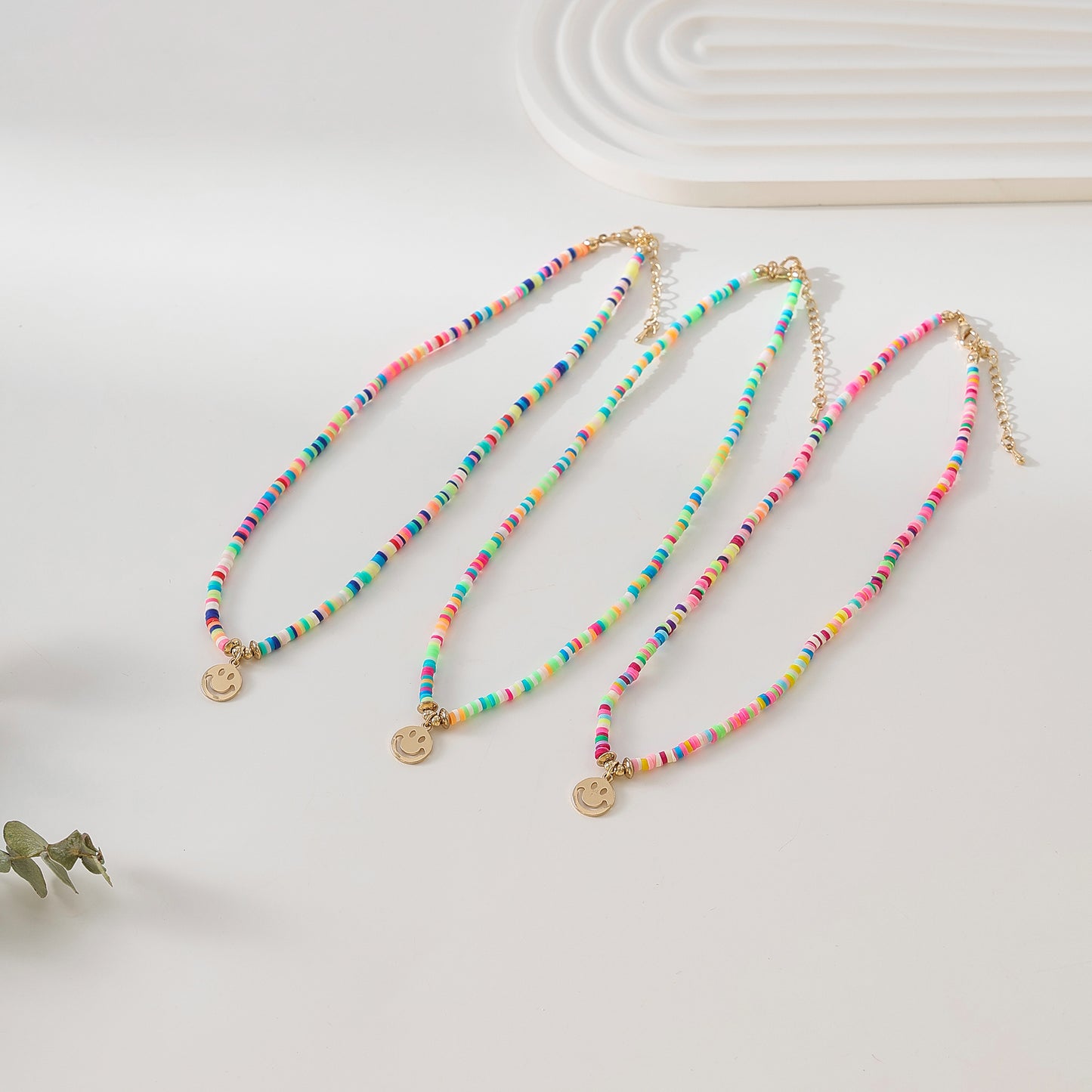 Colorful Thin Fimo Bead Necklace with Gold - Tone Smiley Face Pendant, Boho - Style Jewelry for Women