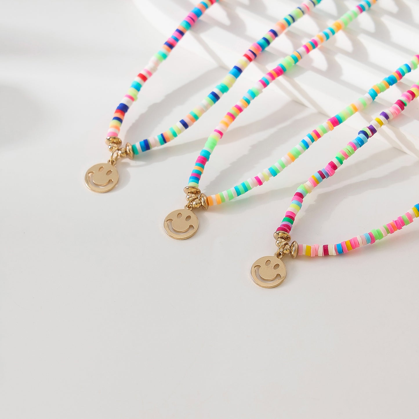 Colorful Thin Fimo Bead Necklace with Gold - Tone Smiley Face Pendant, Boho - Style Jewelry for Women