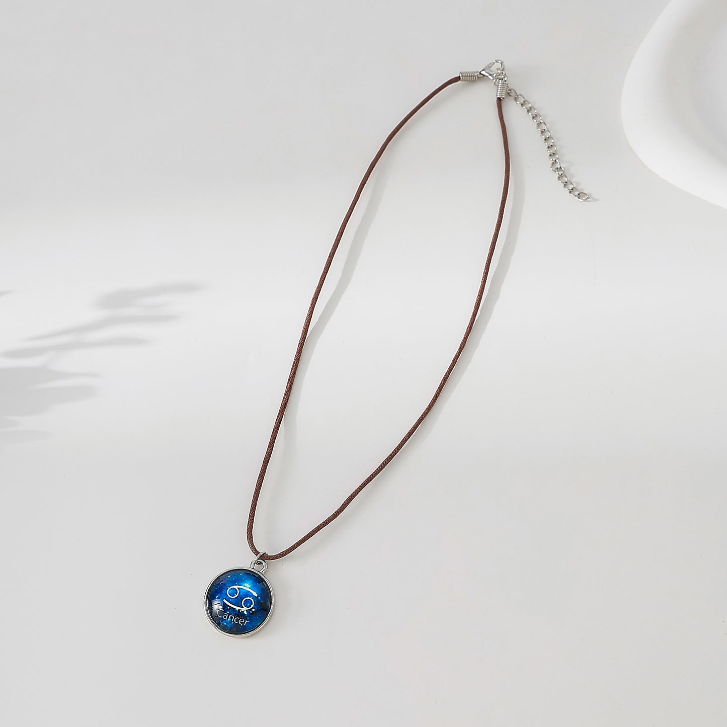 Enchanting Zodiac - Cancer Blue Disk Pendant Necklace on Premium Leather Cord