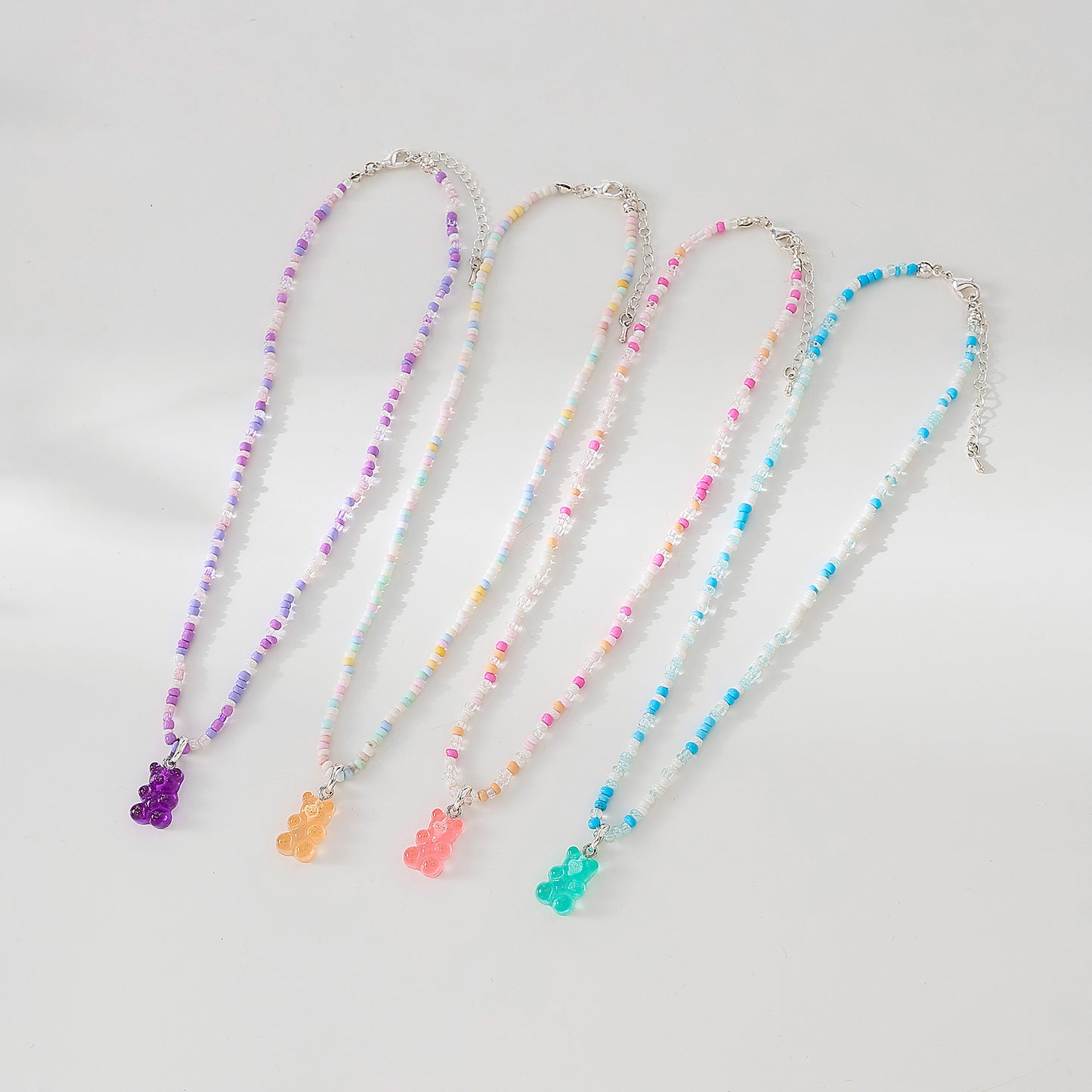 Assorted pastel mix beaded Necklace with gummy Bear charm