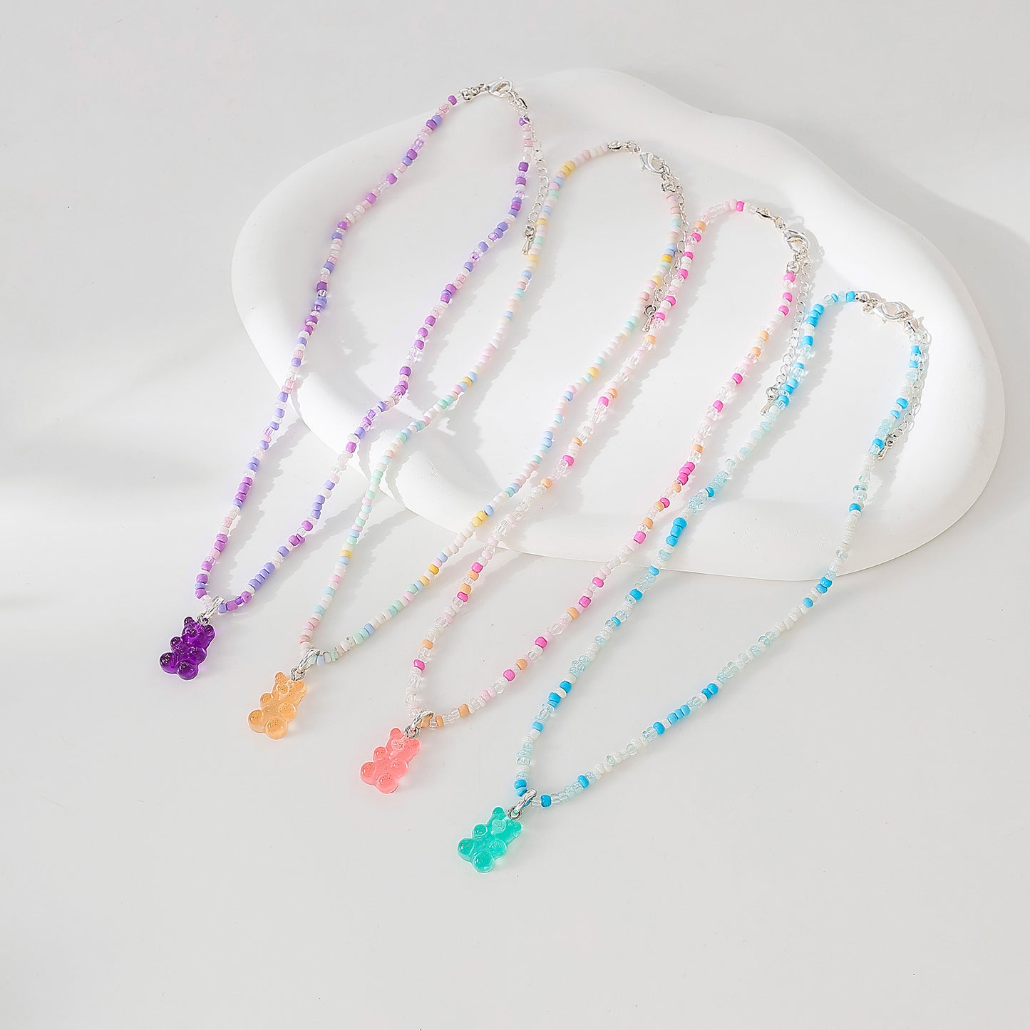 Assorted pastel mix beaded Necklace with gummy Bear charm