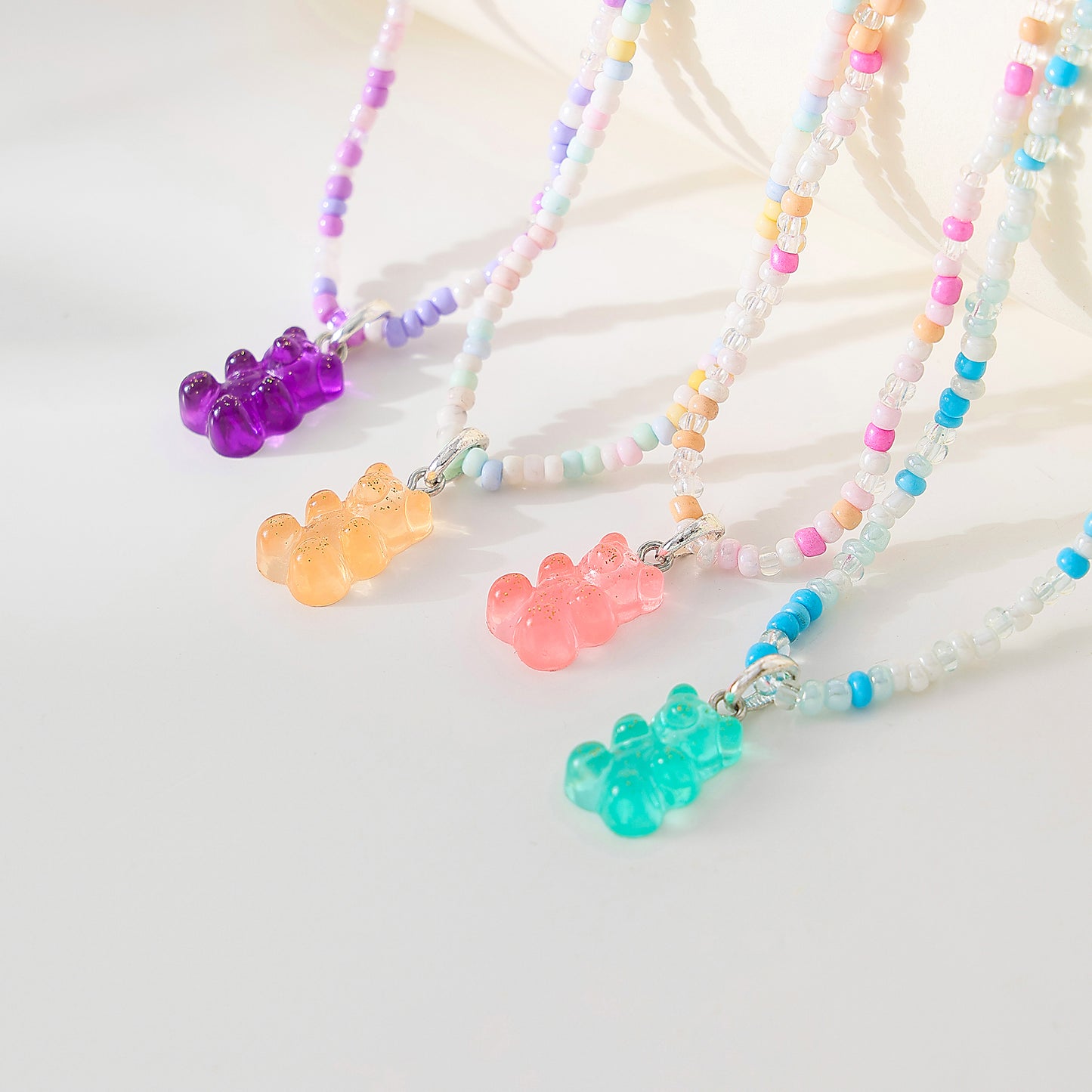 Assorted pastel mix beaded Necklace with gummy Bear charm