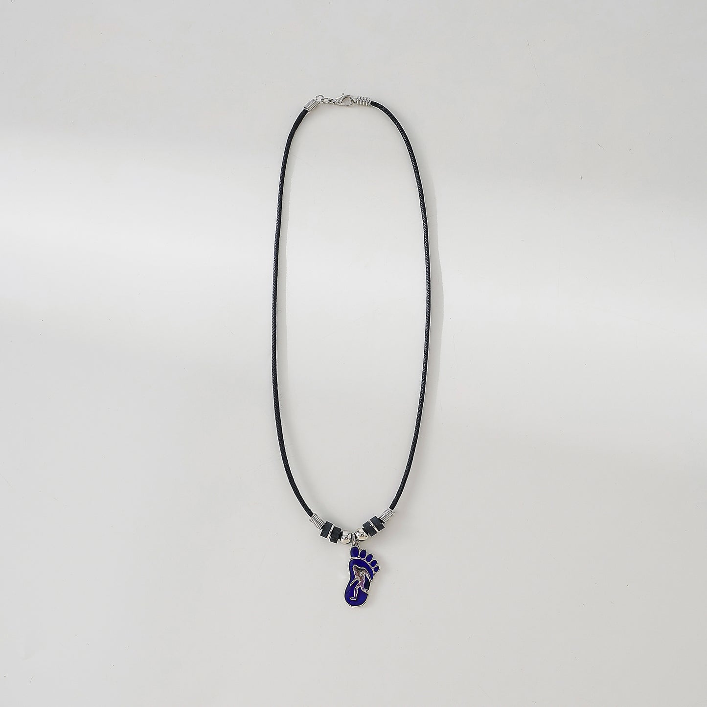 Mood Big Foot figure in Foot Print necklace