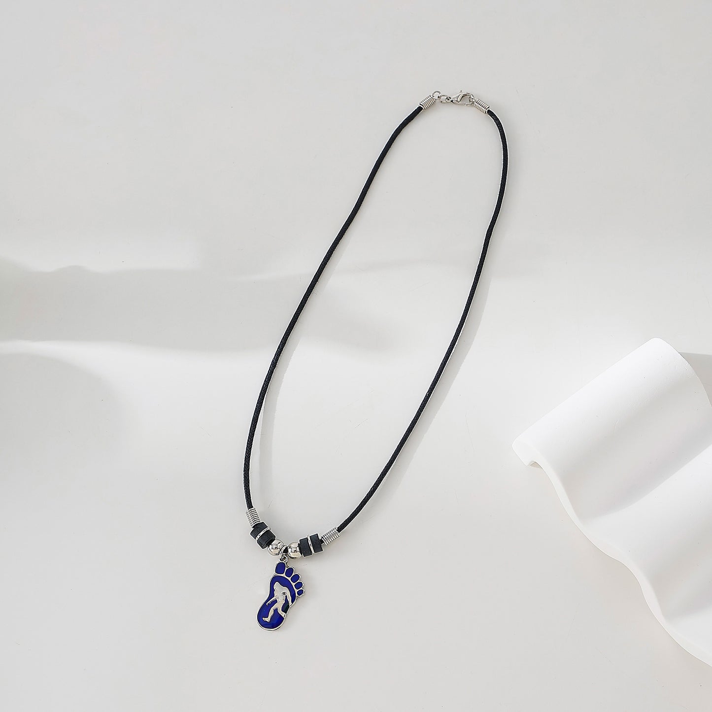 Mood Big Foot figure in Foot Print necklace