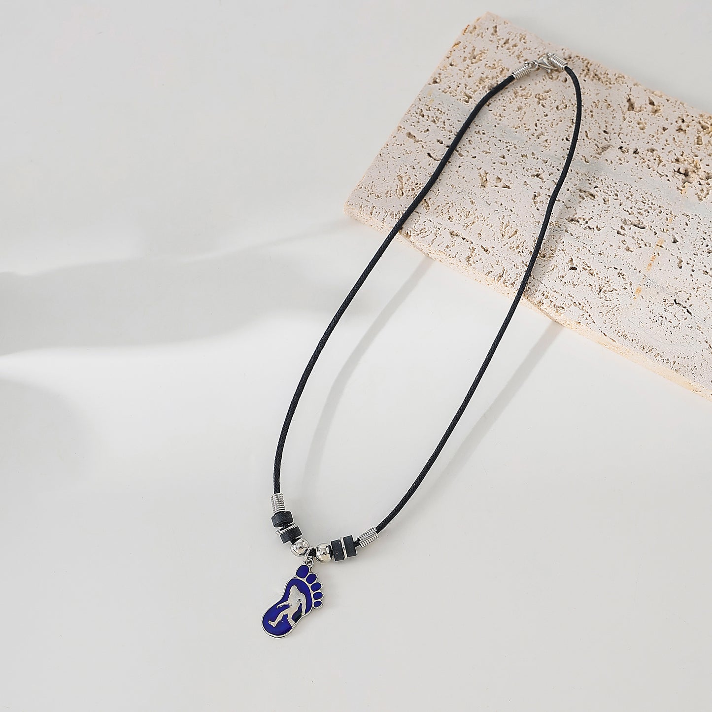 Mood Big Foot figure in Foot Print necklace