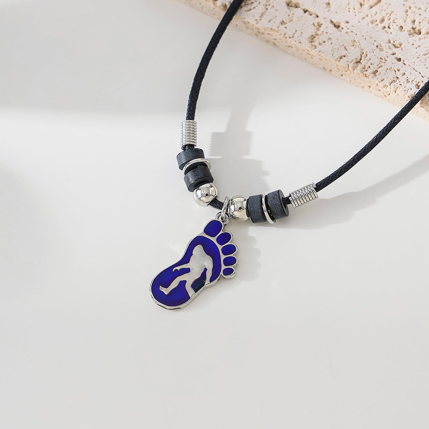 Mood Big Foot figure in Foot Print necklace