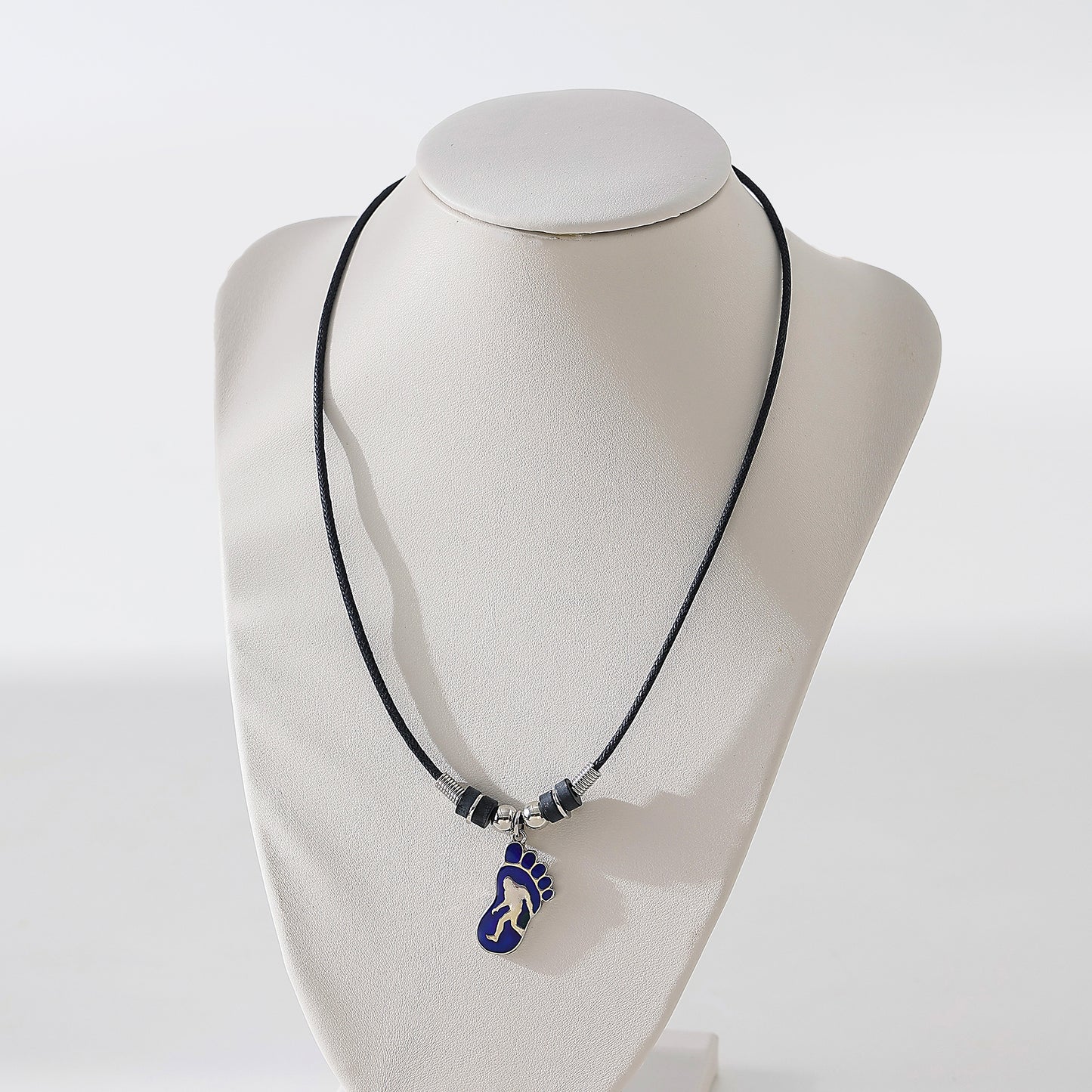 Mood Big Foot figure in Foot Print necklace