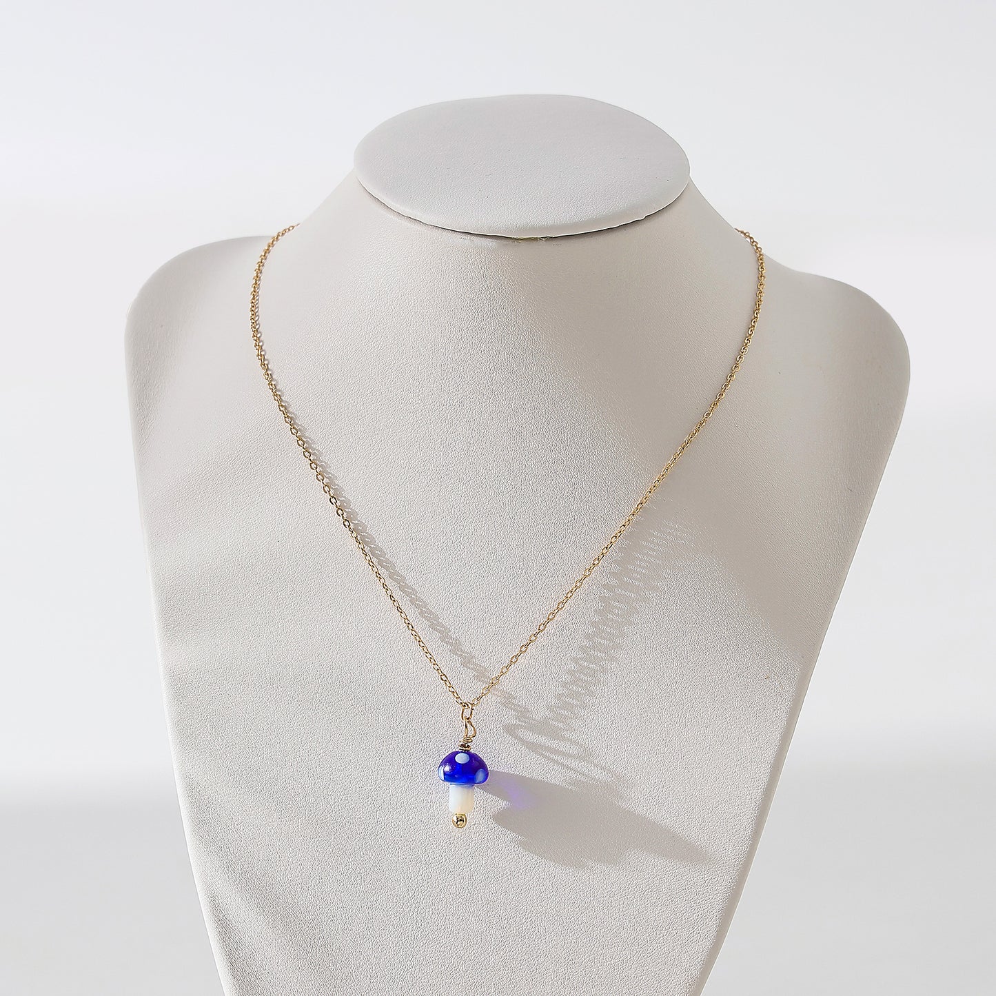 glass Mushroom charm Necklace on a gold chain