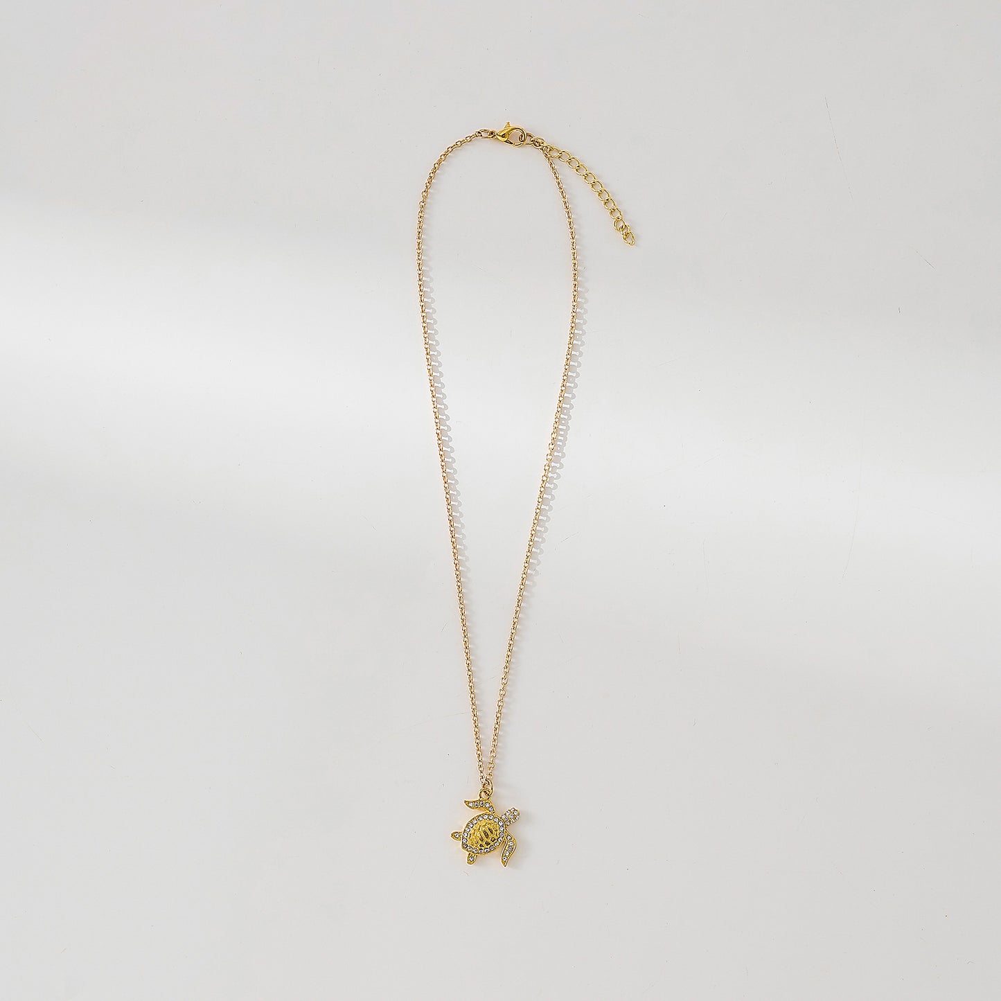Golden Turtle Necklace with clear crystals