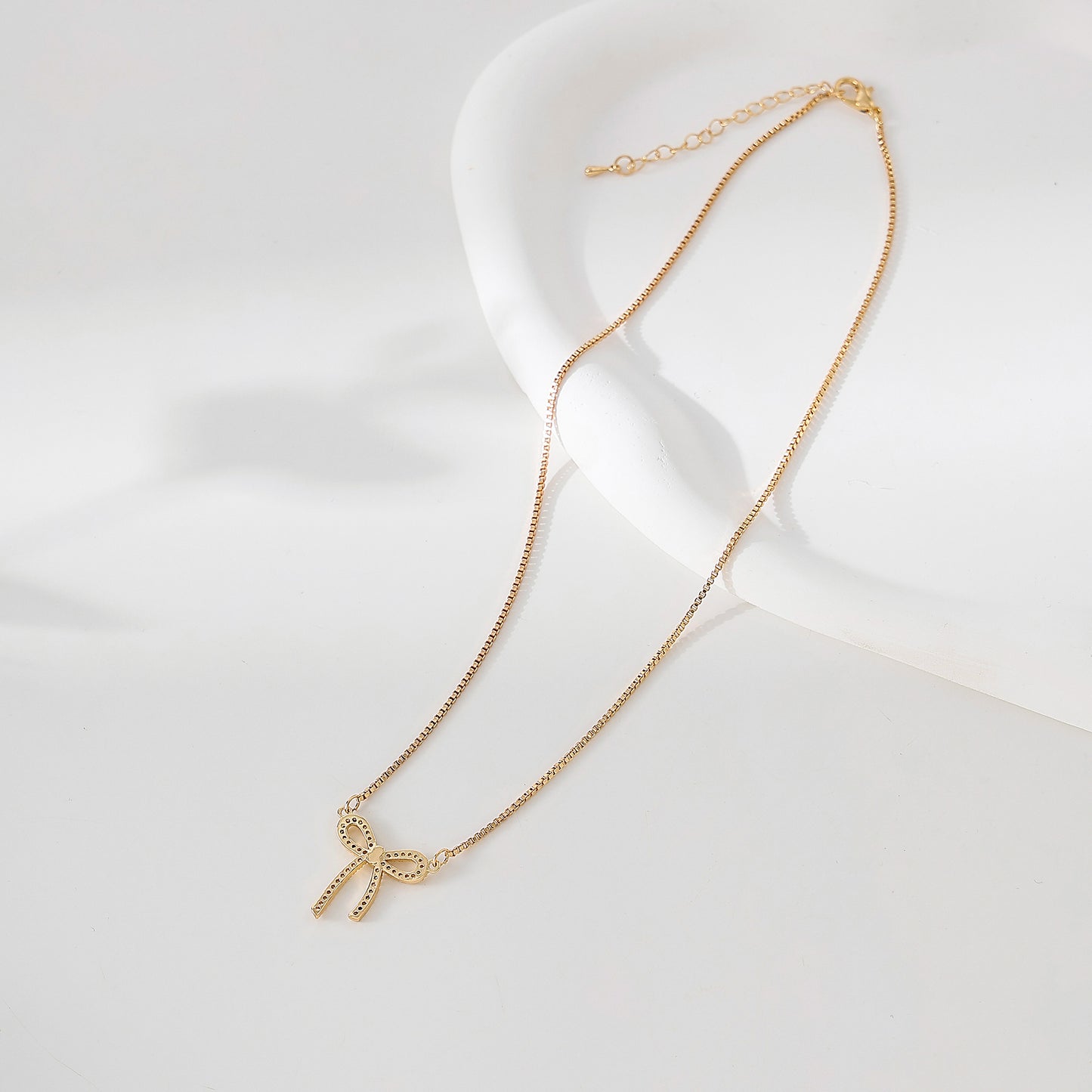 Golden and Crystal Bow Necklace