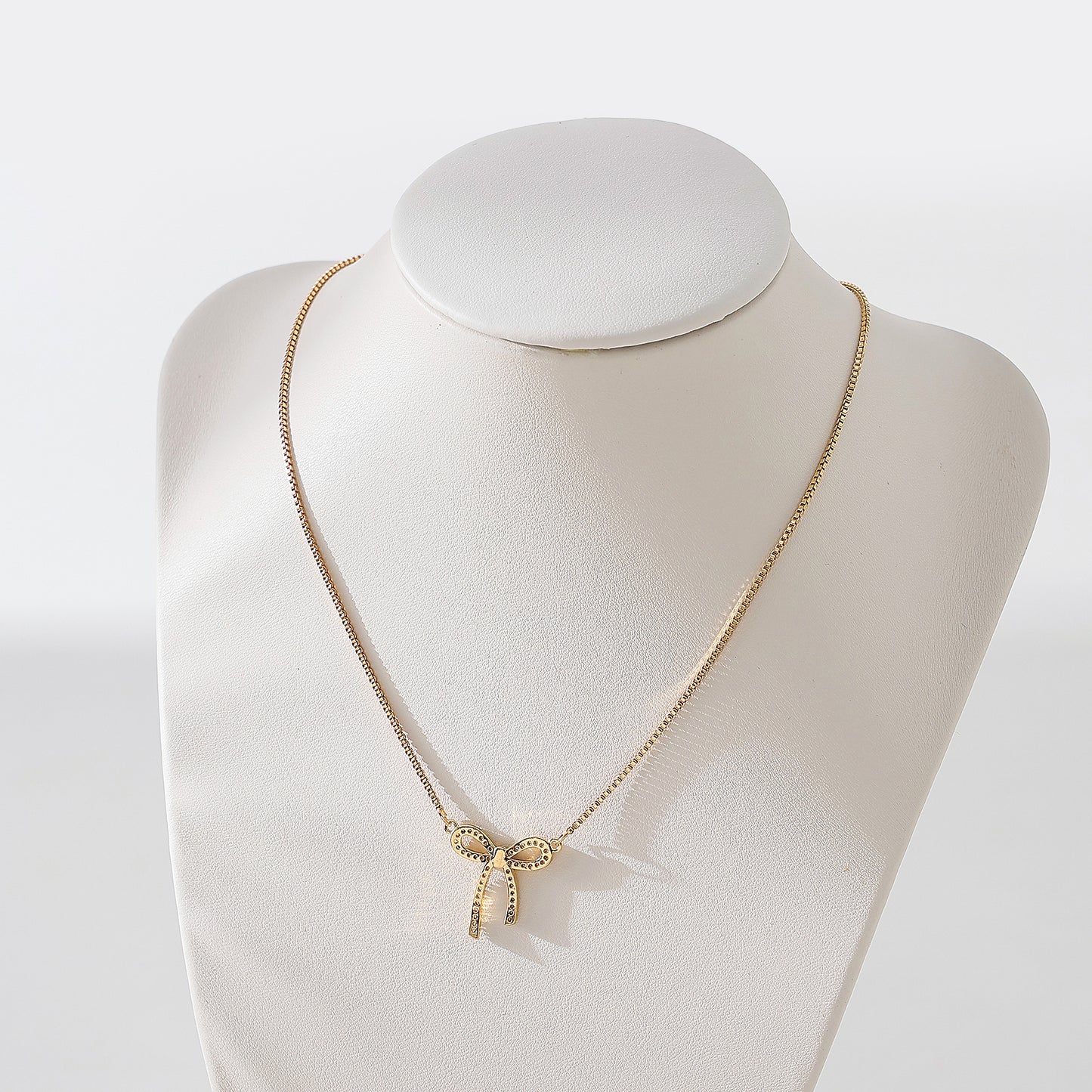 Golden and Crystal Bow Necklace