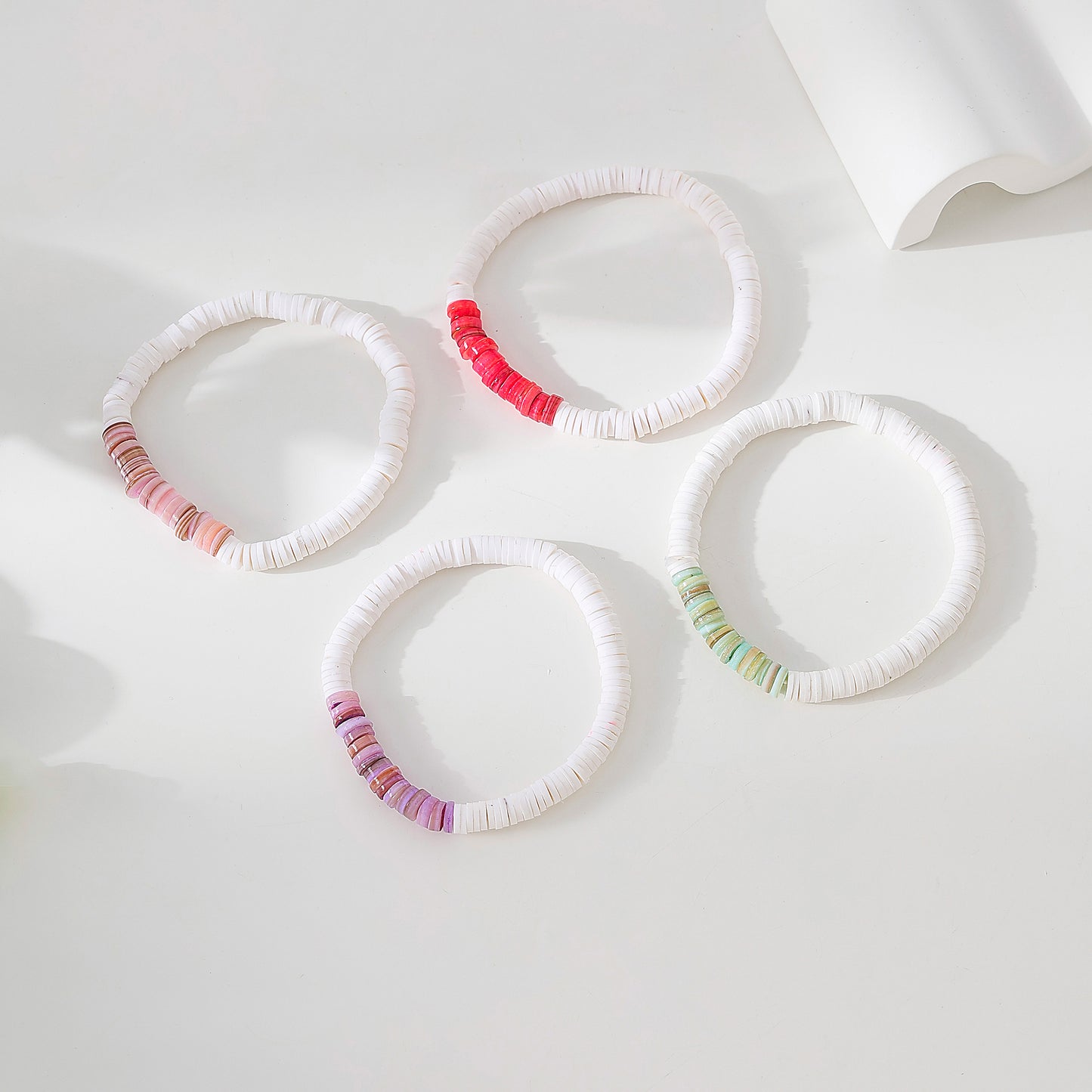 White Fimo beads with assorted colored shell beaded Bracelet