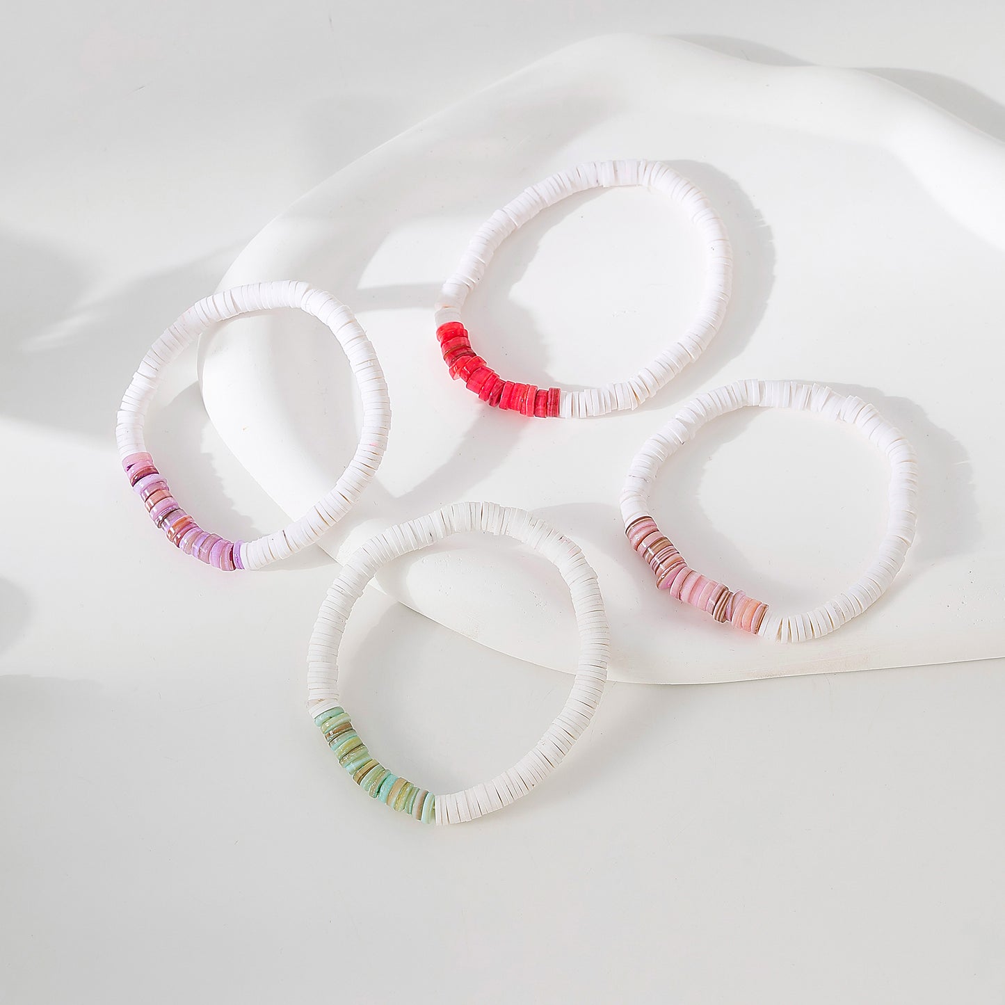 White Fimo beads with assorted colored shell beaded Bracelet