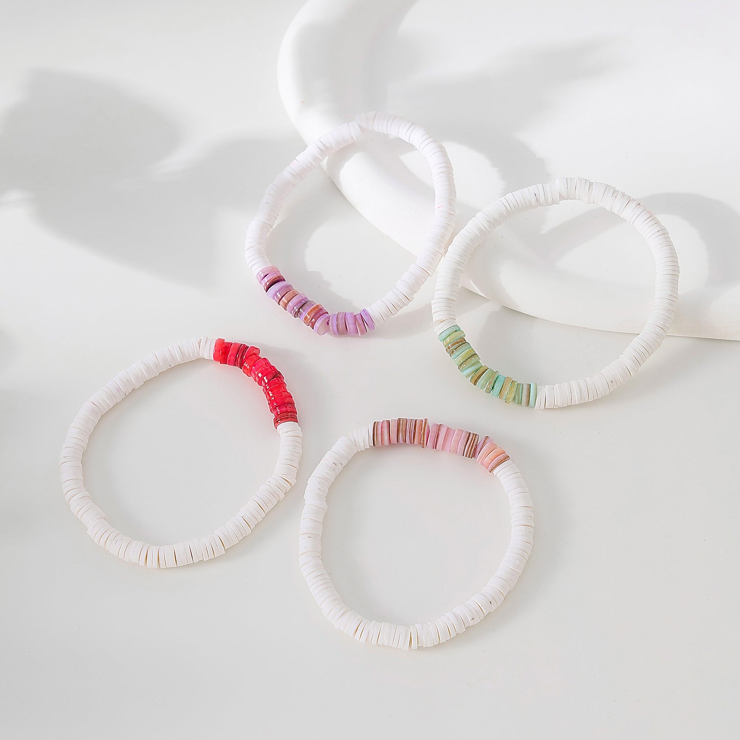 White Fimo beads with assorted colored shell beaded Bracelet