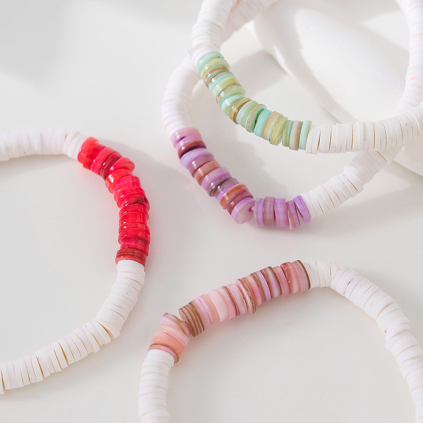 White Fimo beads with assorted colored shell beaded Bracelet
