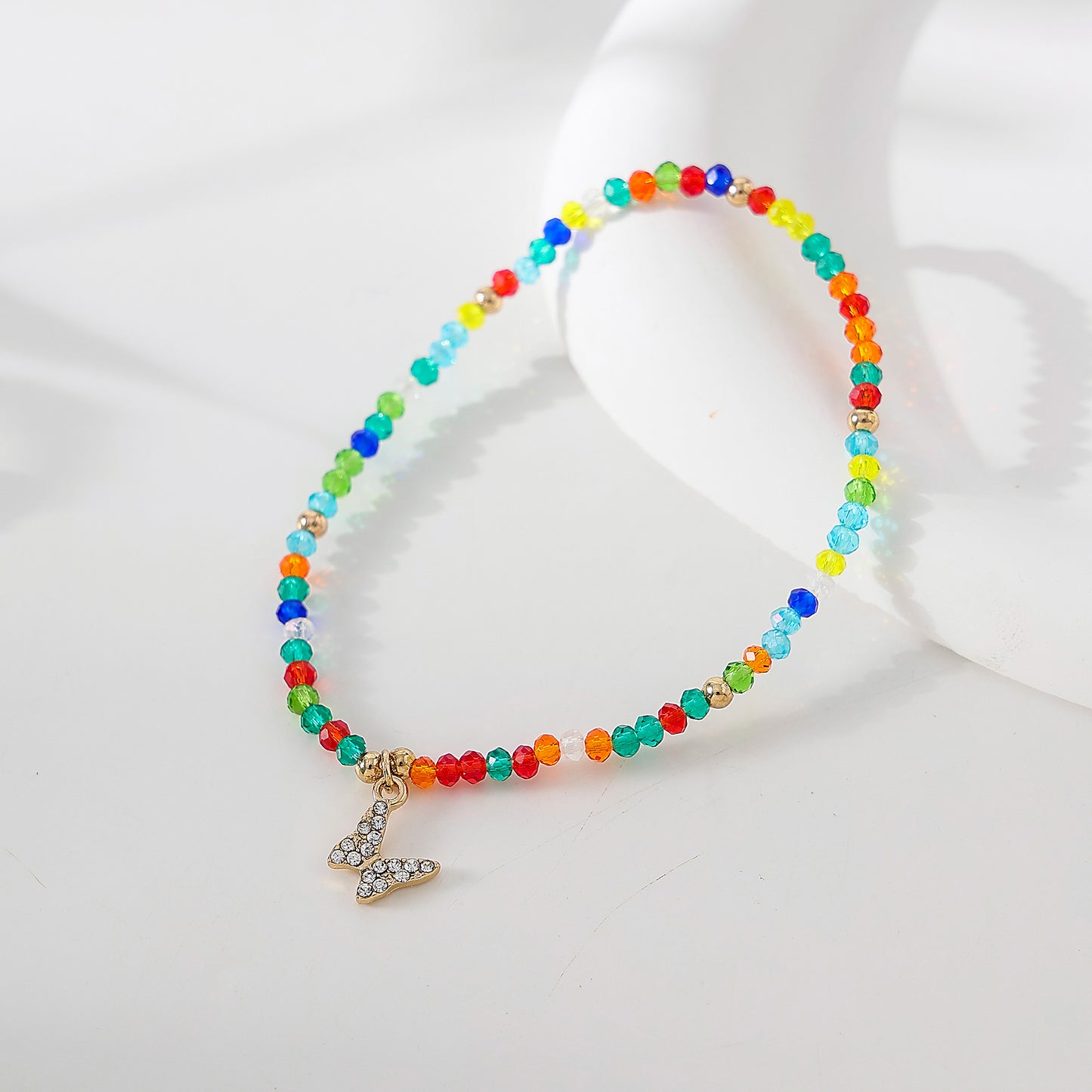 Assorted Beaded Bracelet with Small Crystal Butterfly Charm - Delicate and Sparkling Jewelry for Women, Perfect Gift