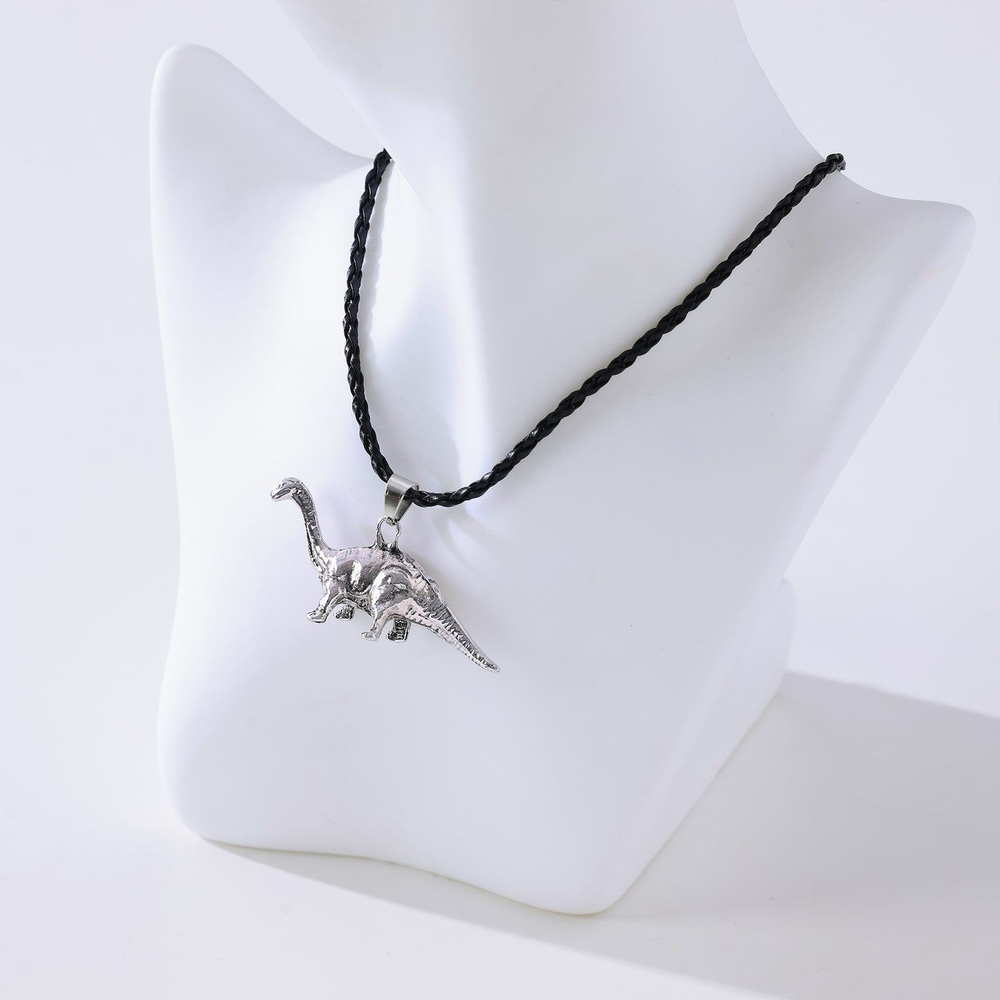 Long Neck Dinosaur Pendant Necklace – Gold-Tone & Pewter Finish, Retro Jurassic Charm on Black Woven & Waxed Cotton Cords, Unique Jewelry for Men & Women