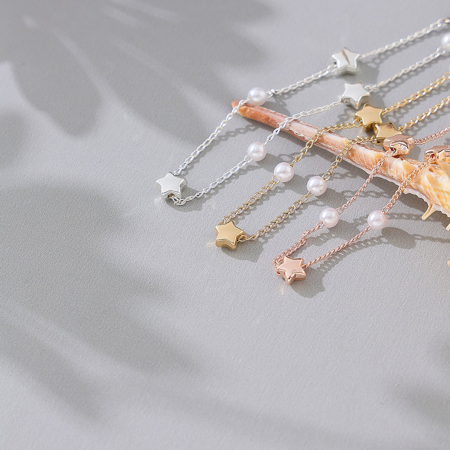 Enchanting Silvery, Golden, and Rose Golden Pearl & Star Charm Bracelets for Women - Perfect for Any Occasion