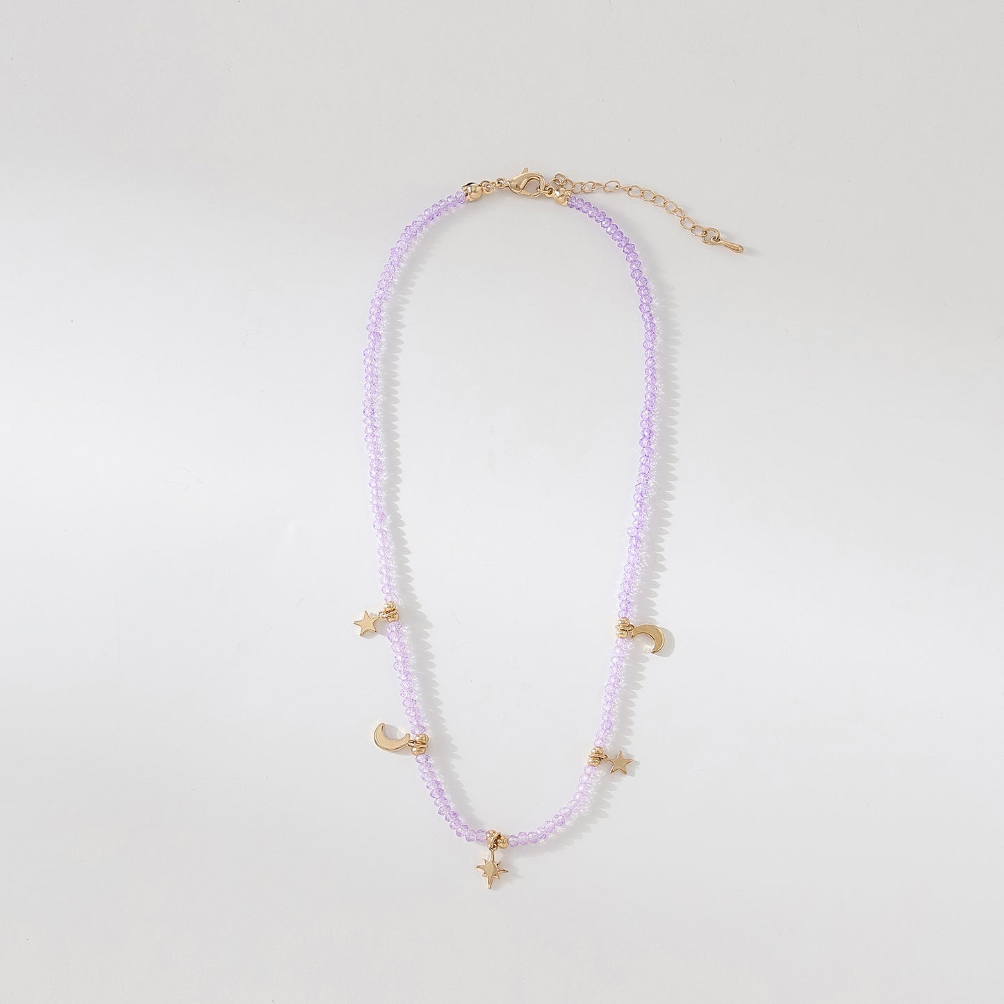 Enchanting 4 - Strand Assorted Bead Necklace with Dainty Moon and Star Charms