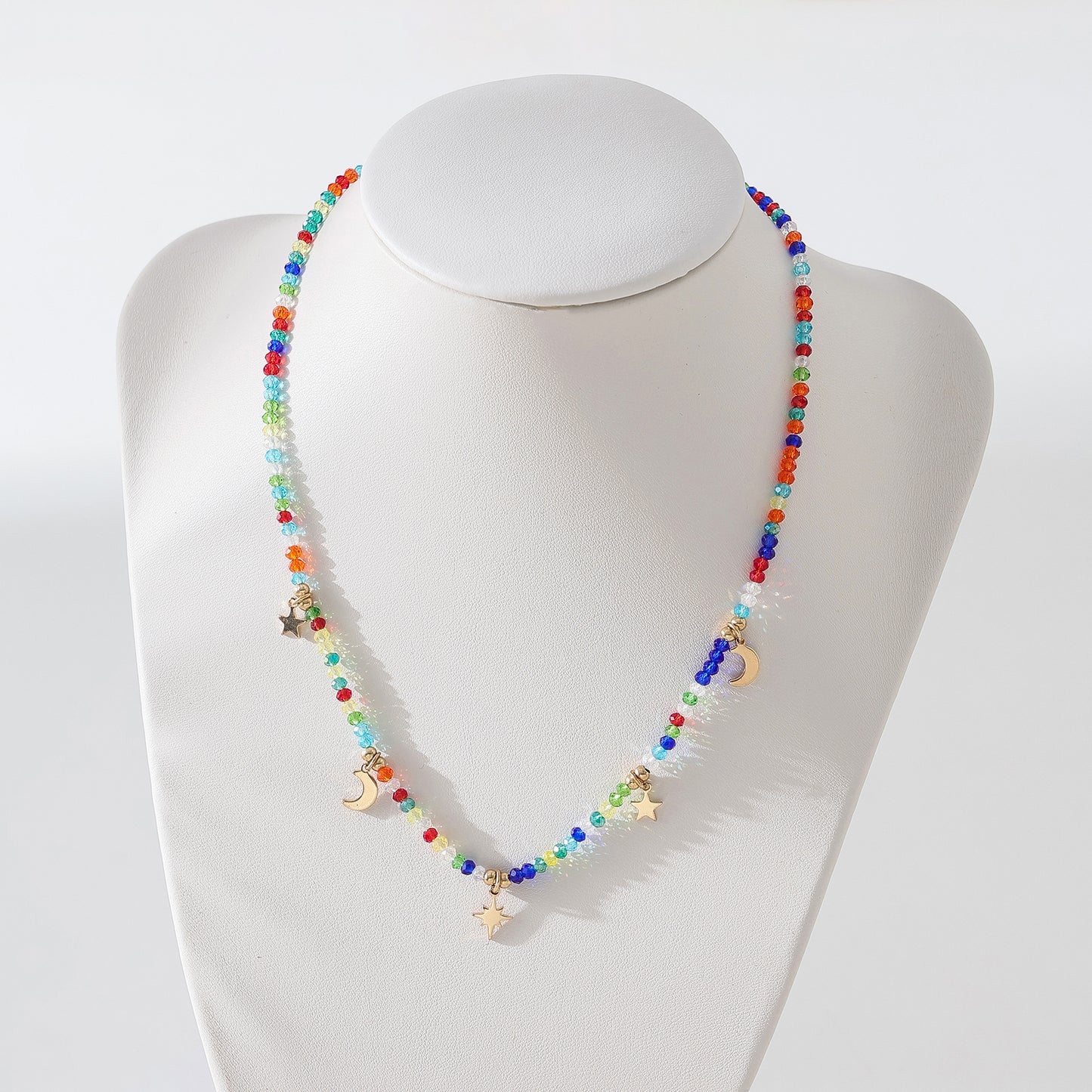 Enchanting 4 - Strand Assorted Bead Necklace with Dainty Moon and Star Charms