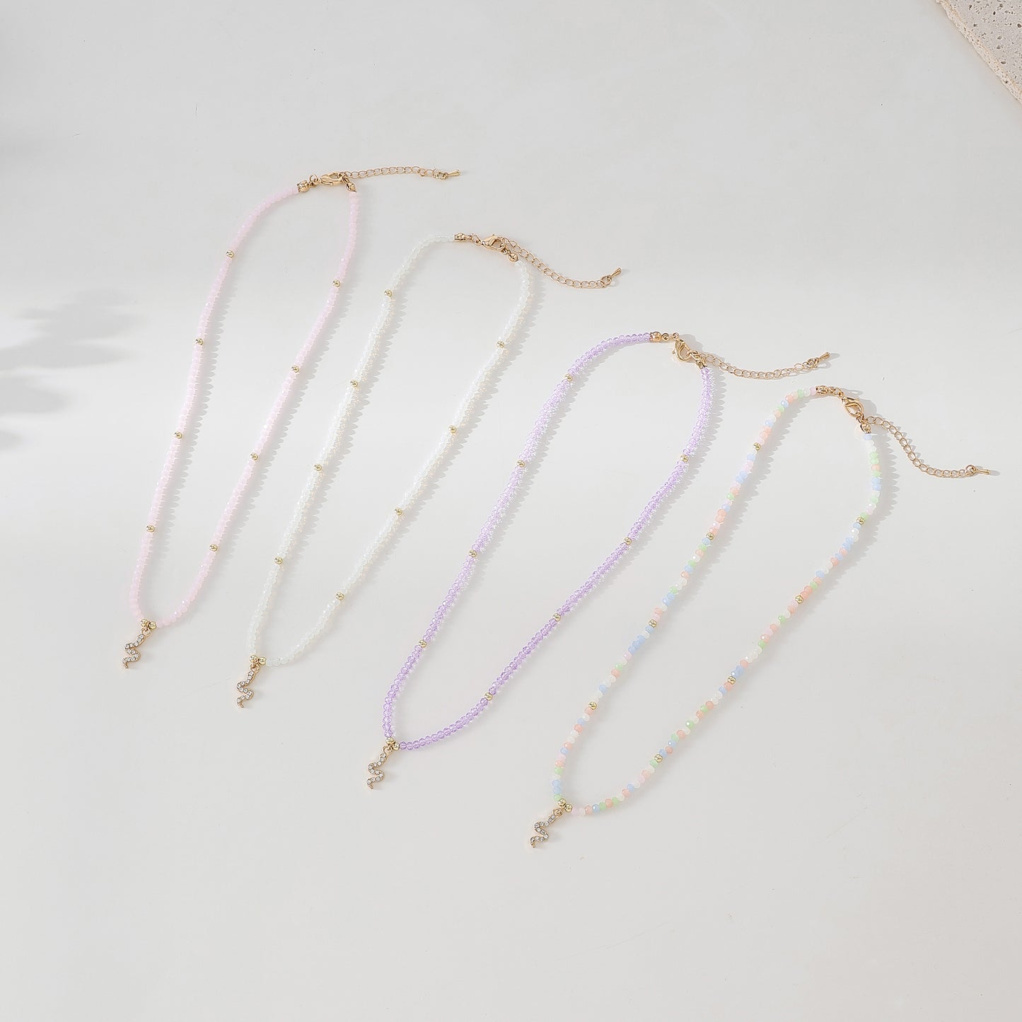 Gold Snake with rhinestones on assorted Beaded Necklace