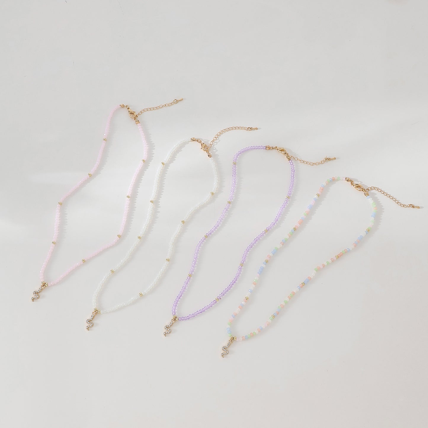 Gold Snake with rhinestones on assorted Beaded Necklace