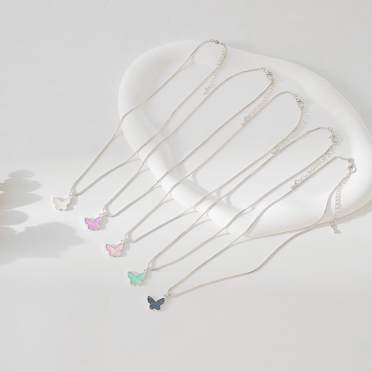 Silvery box chain Necklace with assorted colored Butterfly charms