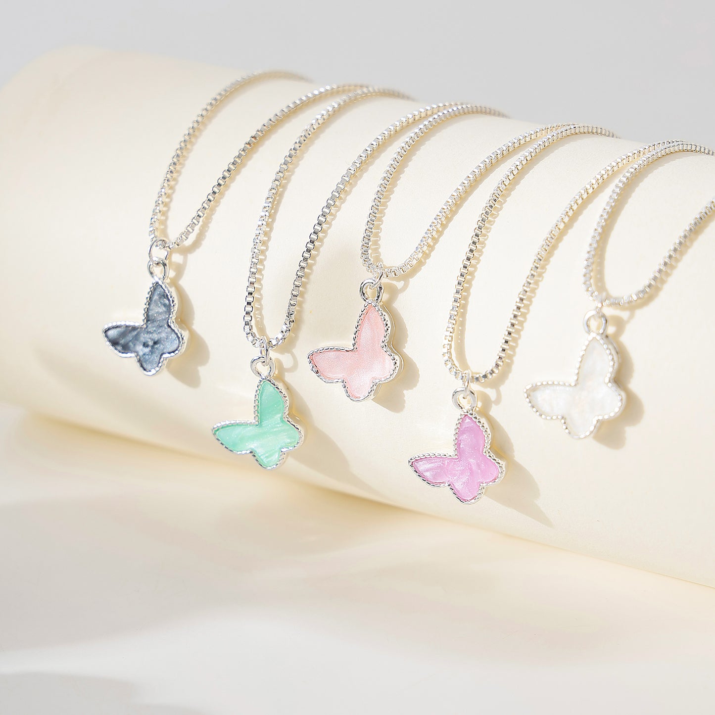 Silvery box chain Necklace with assorted colored Butterfly charms