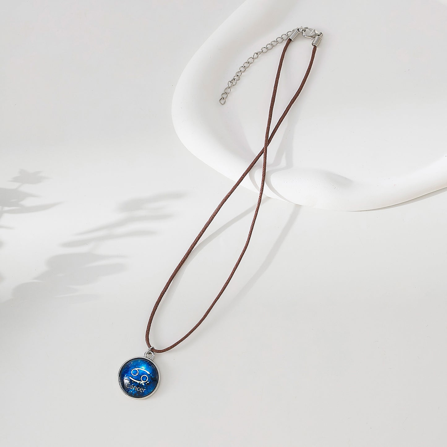 Enchanting Zodiac - Cancer Blue Disk Pendant Necklace on Premium Leather Cord