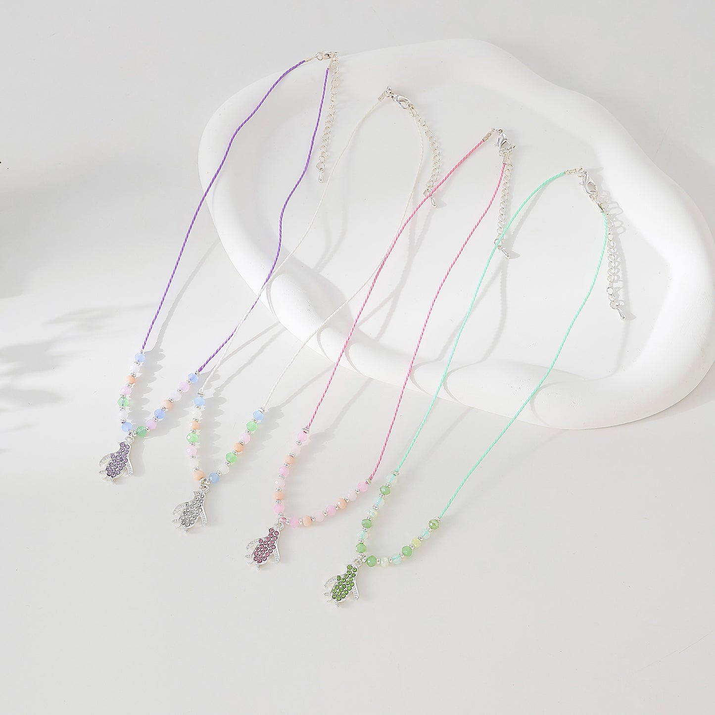 colored Crystal Penguin on beaded string Necklace