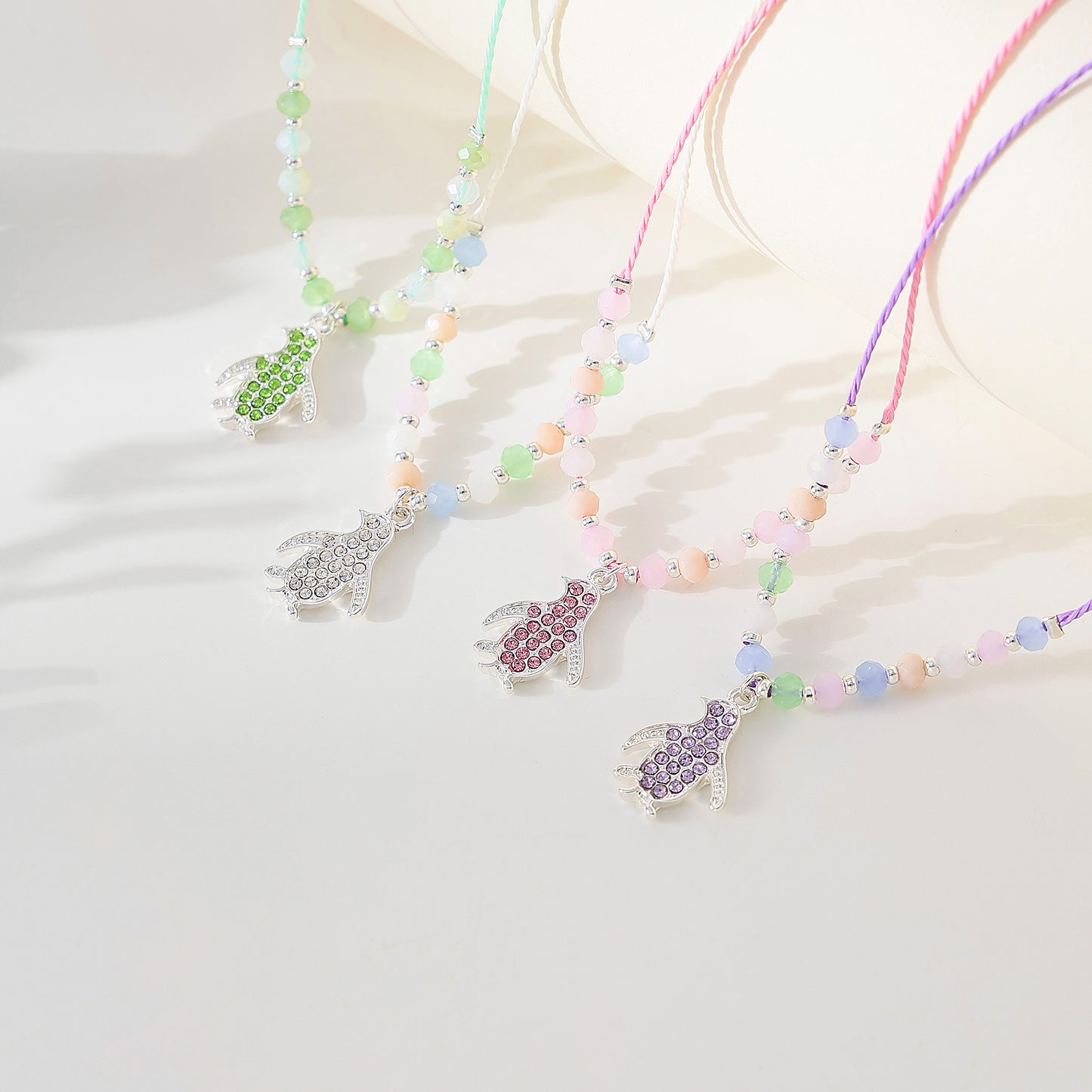 colored Crystal Penguin on beaded string Necklace